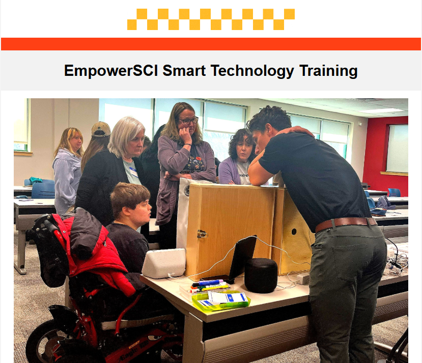 "A photo shows a group of people gathered around a accessible video game workstation