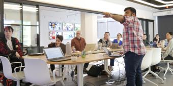 Software Engineer Adit Shat demonstrates the Smart Tech Hub
